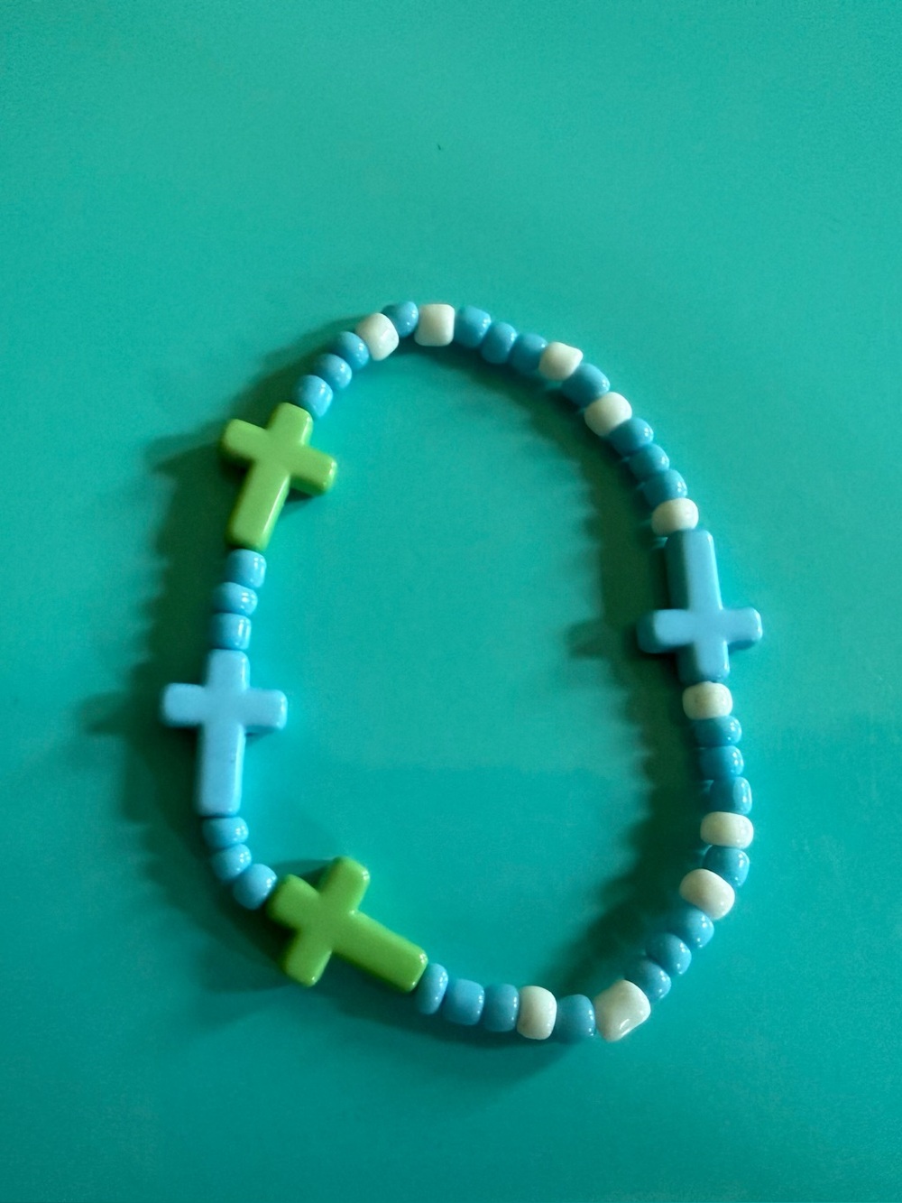Handmade by Josie B’s Beaded Blue Green Cross Bracelet